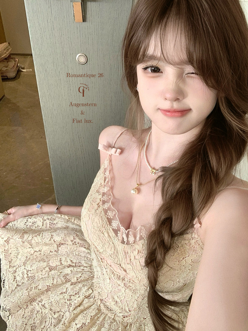 Woman wearing a cream lace dress