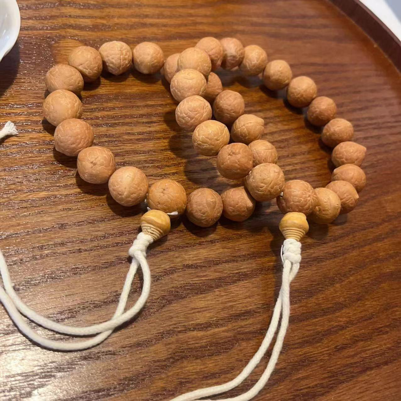 尼泊尔黄皮凤眼菩提子手串手持佛珠文玩男女款念珠原籽正圆单圈