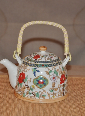 餐厅酒店陶瓷茶壶饭店家用大号老式提梁单壶带过滤网凉水壶1000ML