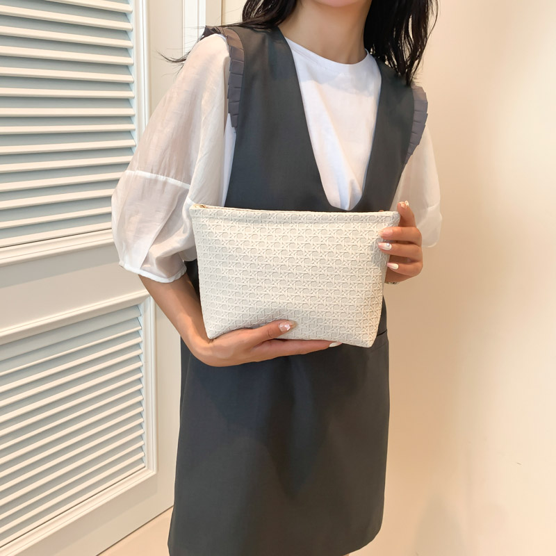 化妆包新款马卡龙色编织纹收纳大容量化妆包品水乳刷包便携洗漱包
