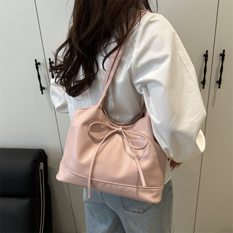 韩版大容量单肩包包女士2026夏季新款红色蝴蝶结托特包通勤手提包