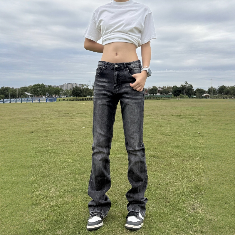 黑色微喇修身牛仔裤男女新款