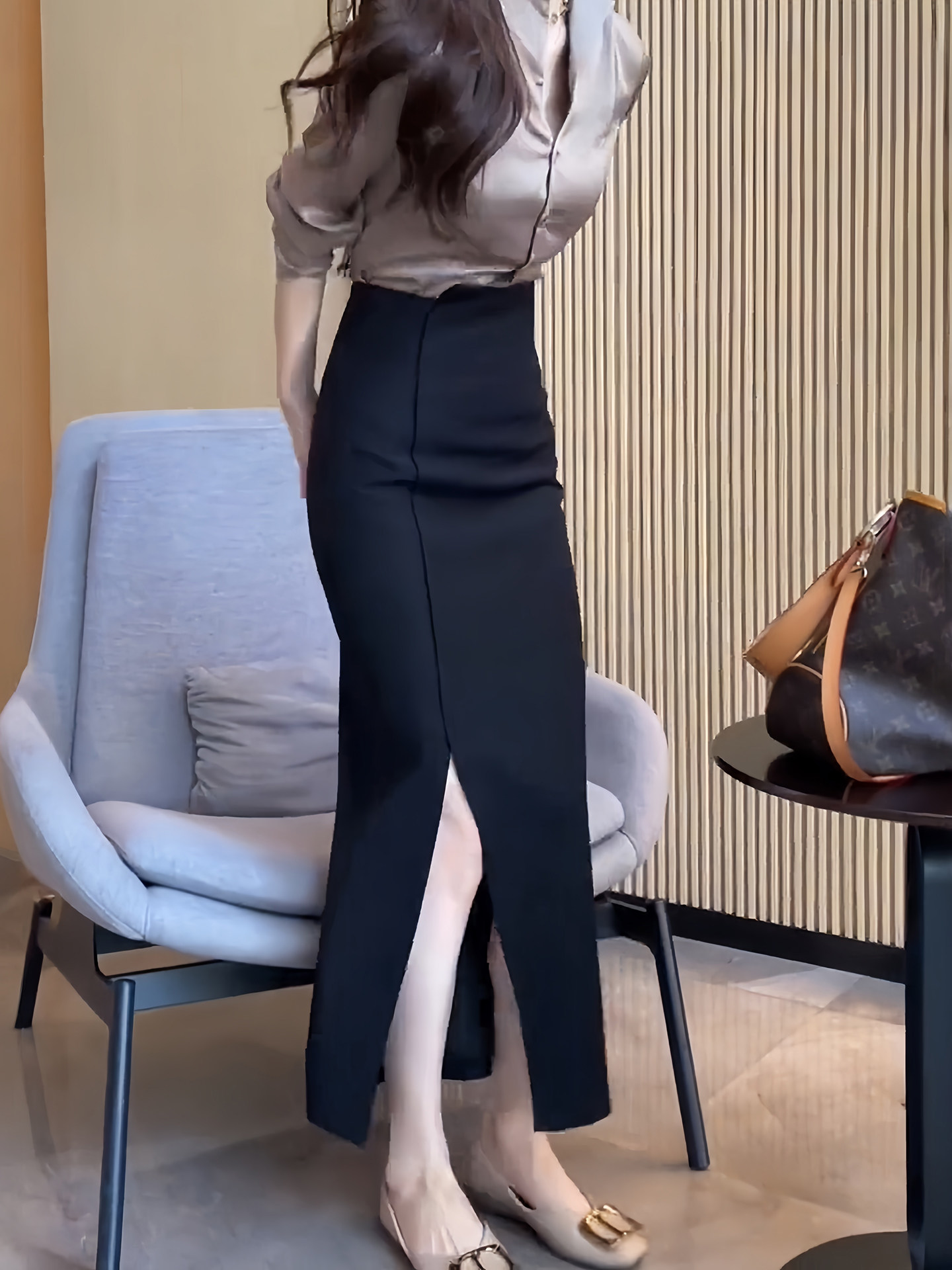 侧开叉高腰不规则半身裙女2025秋季新款黑色气质高级感包臀中长裙