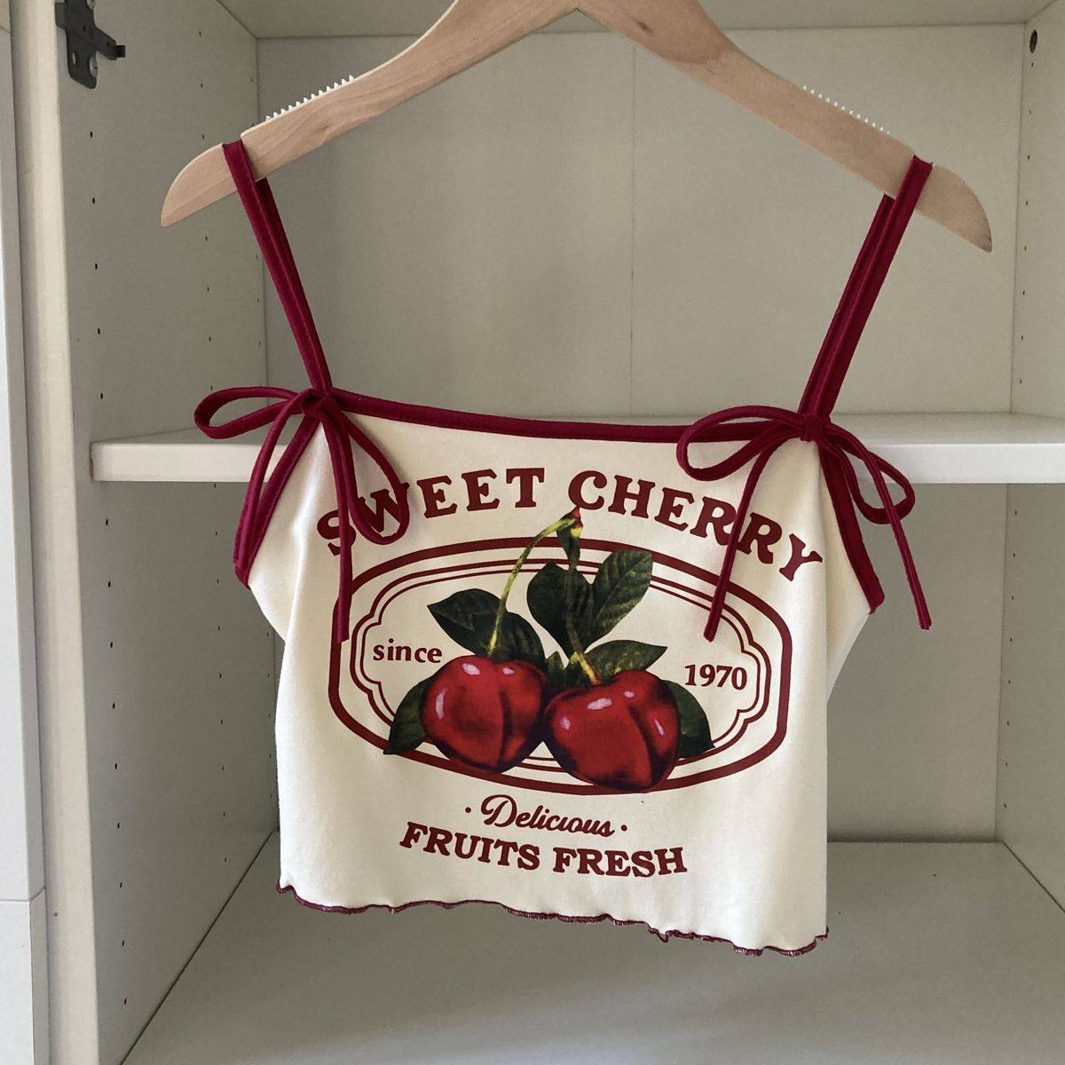 2025夏季新款女宝宝樱桃蝴蝶结绑带吊带女童时尚无袖百搭短款上衣