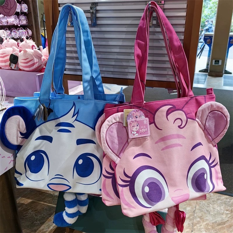 珠海长隆动物园海洋王国纪念品琦琦卡卡毛绒尾巴帆布包单肩手提包