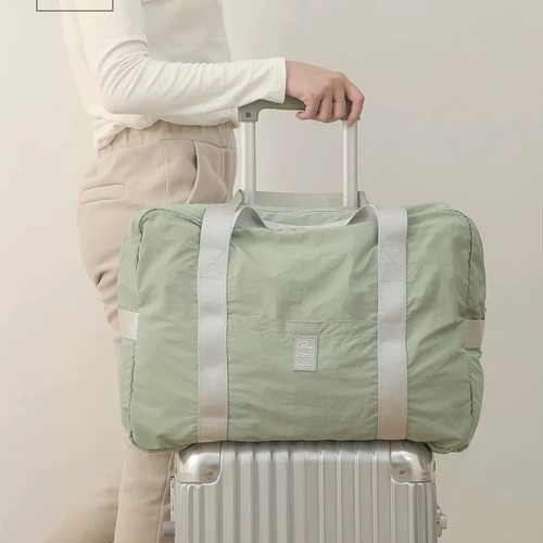 手提大容量可折叠行李包