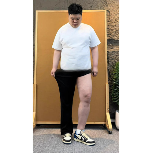 黑色517弹力弯刀牛仔裤男款