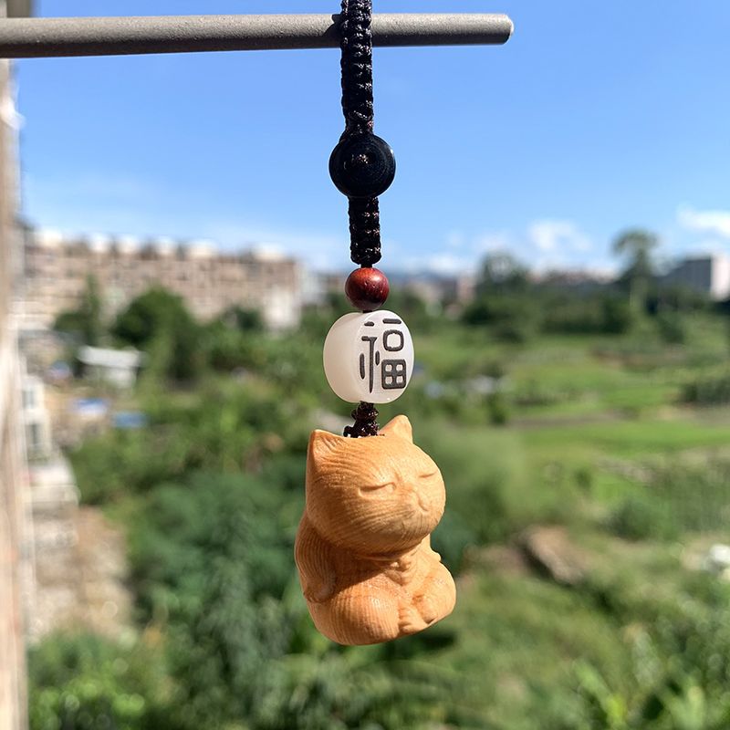 可爱呆萌猫咪实木雕刻傲娇小猫日图片