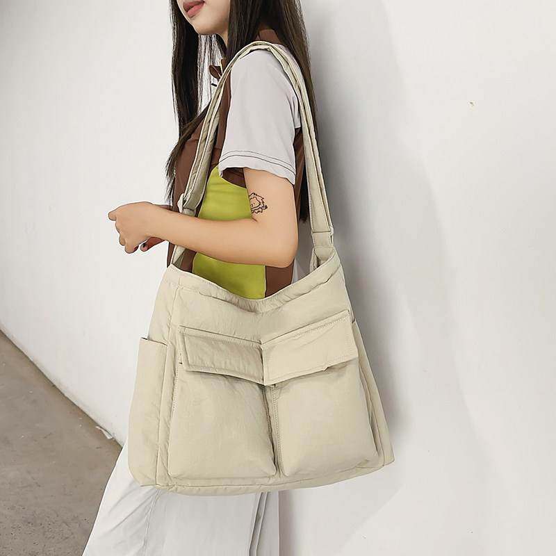 韩版简约百搭单肩包女2025新款大容量通勤托特帆布包学生上课背包,箱包皮具/热销女包/男包,时尚帆布包,淘宝优惠券,粉丝福利购,淘宝优惠卷