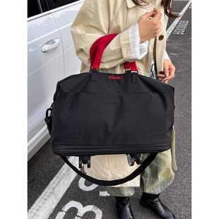 黑色男款行李包带滑轮可套拉杆结实耐用短途旅行袋女大容量手提包