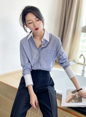 2025新款蓝色条纹衬衫女拼接设计感小众气质ol通勤高级感加绒衬衣