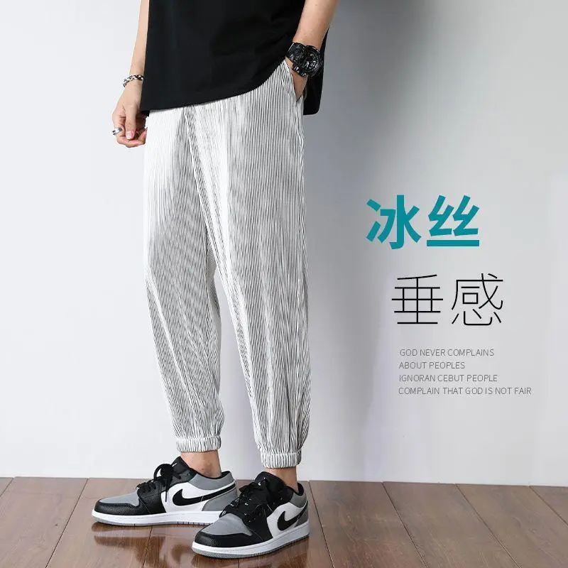 冰丝裤子男休闲宽松百搭加大弹力速干薄款哈伦空调显瘦九分裤潮