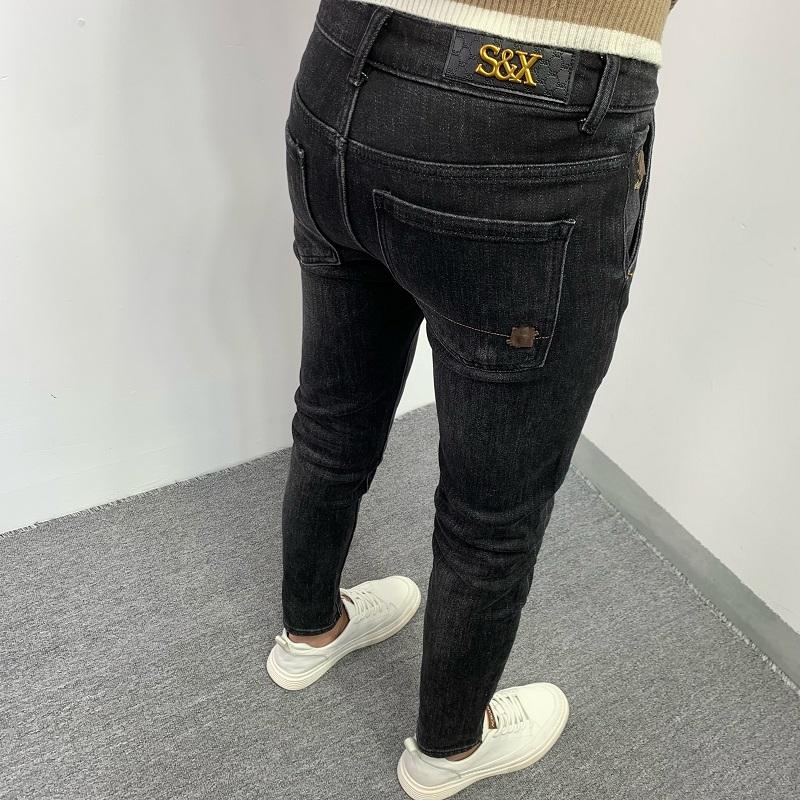 修身牛仔裤冬季加绒黑色刺绣长裤