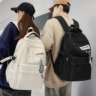 简约书包男生高中生大容量女生初中生中学生宽肩带减压防水女双肩