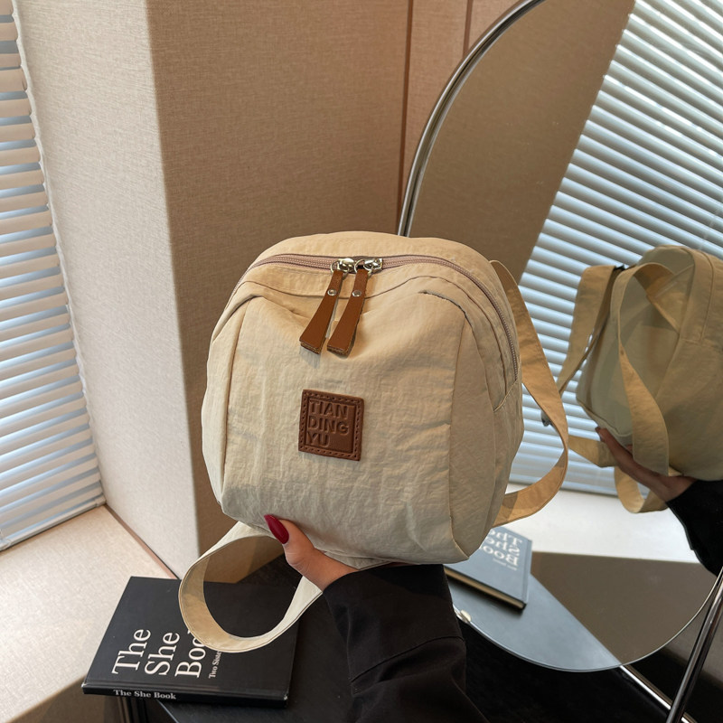 轻便贝壳小布包包女2026新款潮韩版休闲百搭斜挎包小众设计单肩包