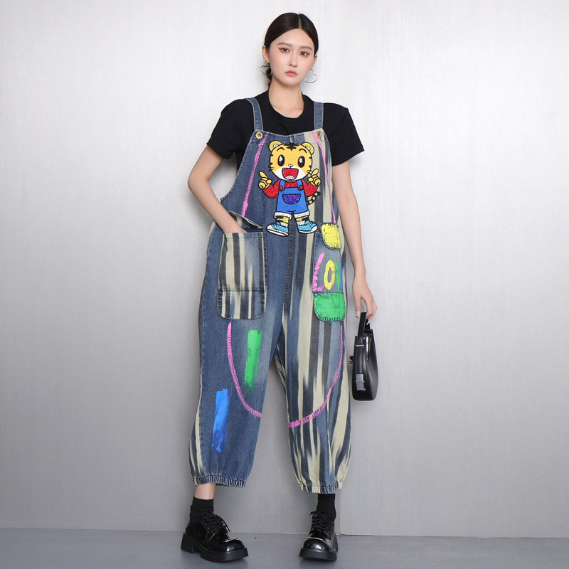 2026春季新款设计感牛仔背带裤女宽松涂鸦印花连体裤休闲街头风,女装/女士精品,牛仔裤,淘宝优惠券,粉丝福利购,淘宝优惠卷