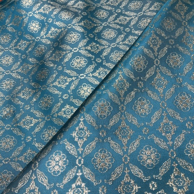 2023新款湖蓝色辽代鱼纹织金古宝纹复原提花面料纱料拜年服设计