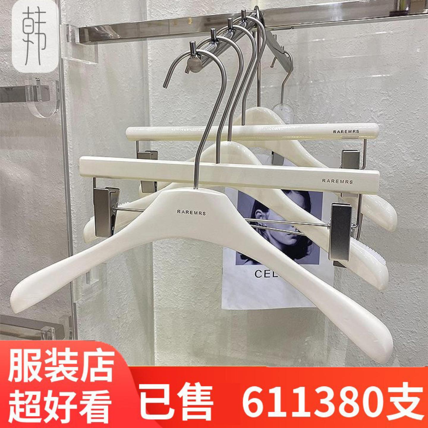 服装店奶白色女装实木衣架衣挂