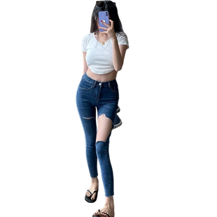 高腰大破洞牛仔裤女春夏季辣妹九分显瘦弹力紧身小脚打底铅笔裤子
