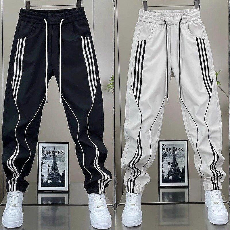 夏季薄款休闲裤男百搭潮牌宽松运动束脚裤2026新款条纹黑色男裤子