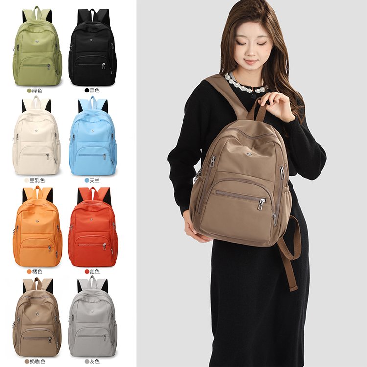 圣喜路简约新款休闲双肩包运动旅行背包大容量尼龙布大学生书包