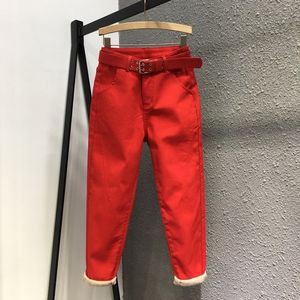 冬装新款大红色加绒加厚牛仔长裤