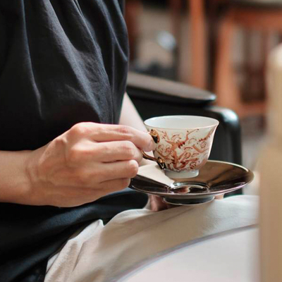 枕石向野矾红梅花诗文镀钛茶杯
