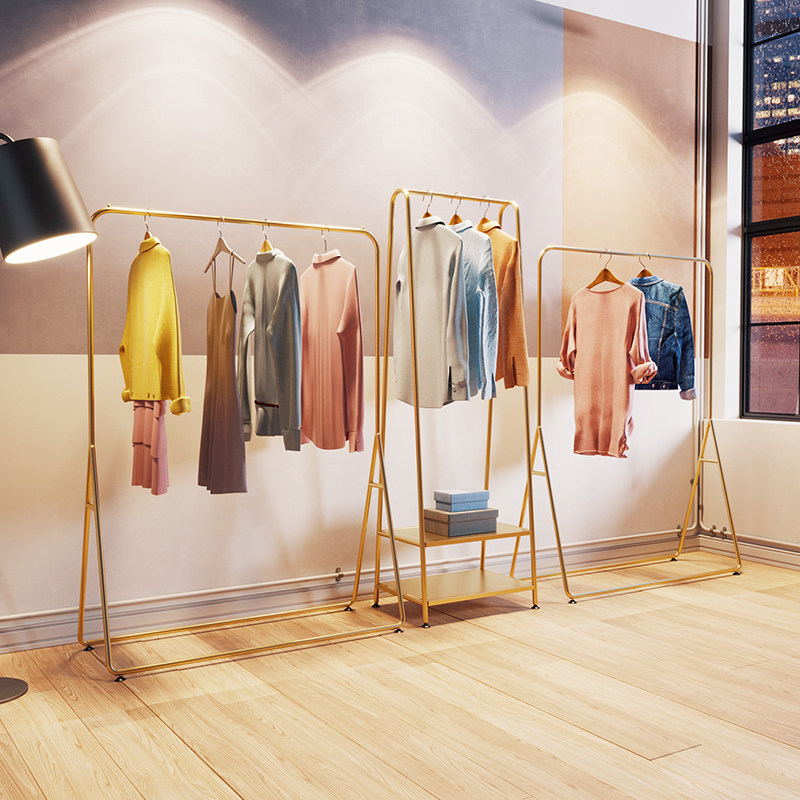 服装店衣服展示架橱窗货架女装店服装架子陈列架服装店装修设计图