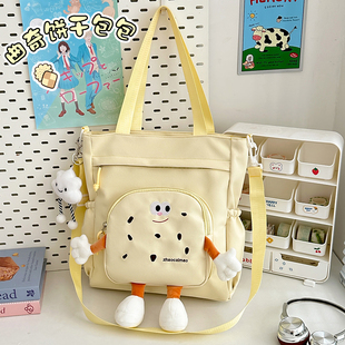 儿童补习袋小学生男孩曲奇饼干补课包女生大容量兴趣班单肩斜挎包