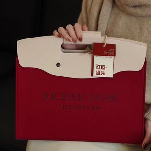 2026新年礼品袋高级感商务伴手礼盒毛毡手提包公司年会礼物包装袋