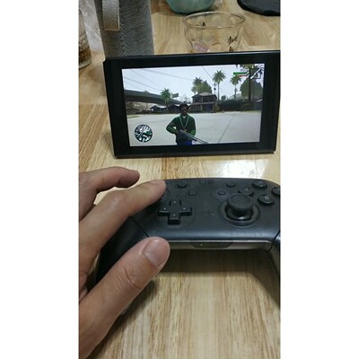【议价产品】任天堂switch pro手柄 黑透 从背面看貌似日版,左握