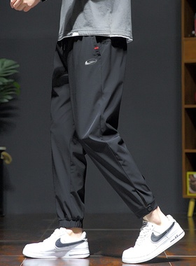 耐克顿休闲裤男士春秋季纯色潮流束脚卫裤黑色宽松百搭帅气束脚裤