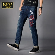 Xu hướng quần jeans nam phiên bản Hàn Quốc của quần lọt khe quần nam thêu lỗ bò quần trẻ trung cá tính - Quần jean