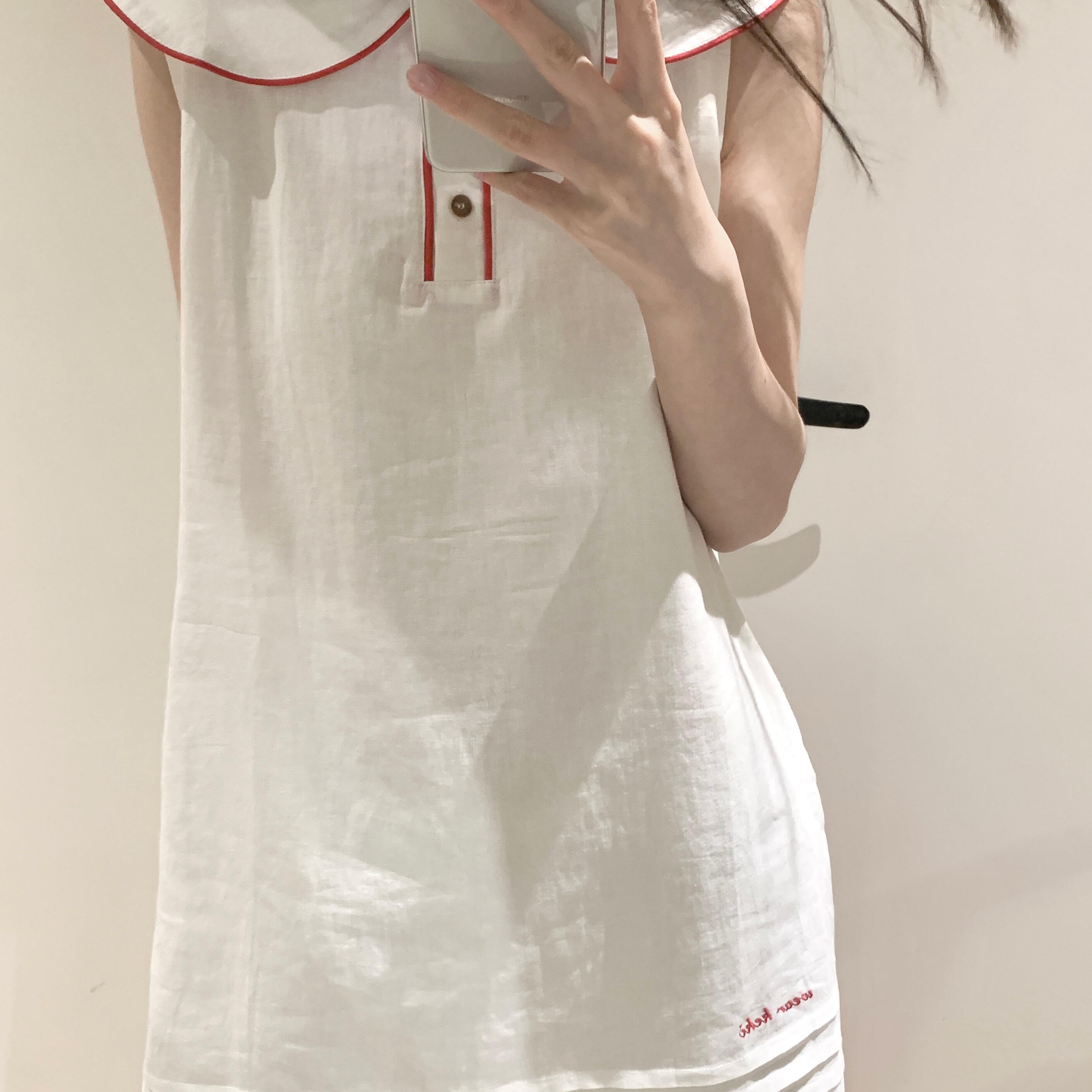 玖月纯白洋桔梗娃娃领连衣裙女夏季新款少女感红色边线纽扣装饰
