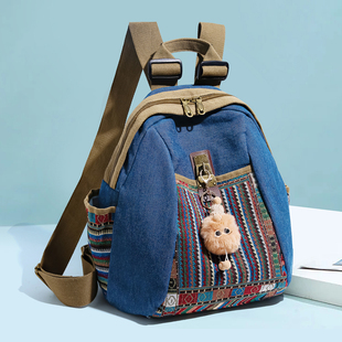 民族风双肩包女新款时尚百搭轻便大容量旅游背包复古帆布包贝壳包