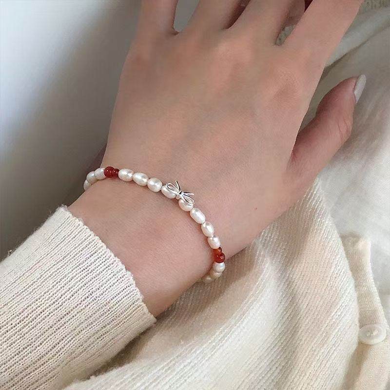 眼观S925银红玛瑙蝴蝶结淡水珍珠红黑玛瑙手链轻奢小众百搭款手链