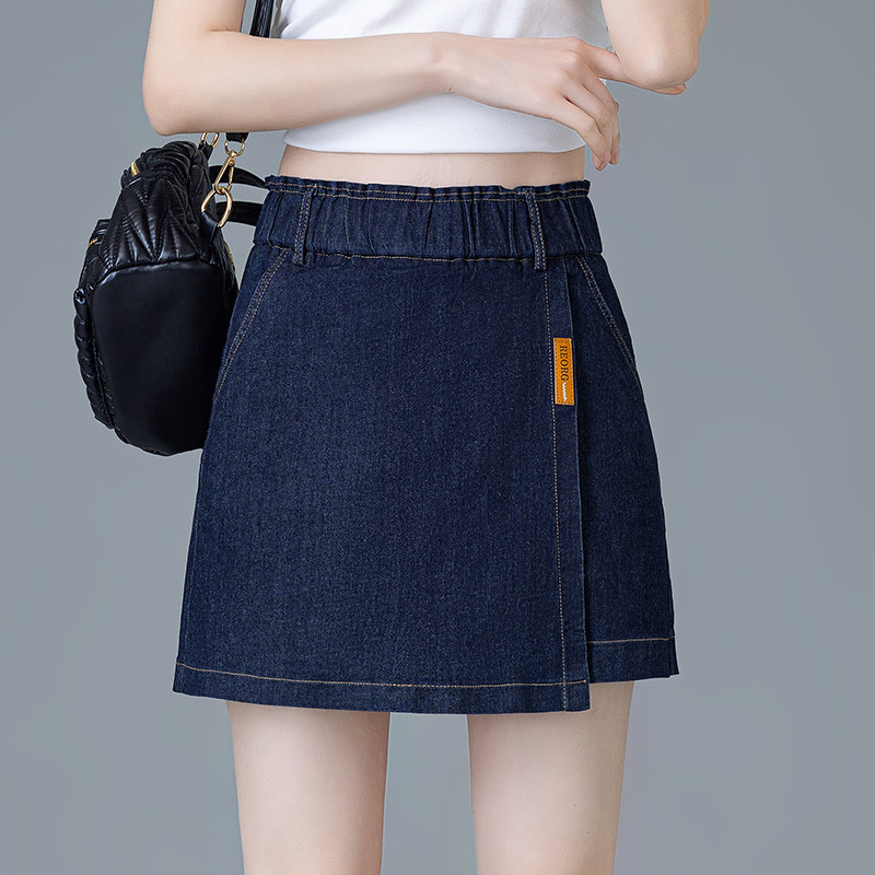 不对称牛仔裙裤女2026夏季新款松紧腰百搭a字假两件深色直筒短裤