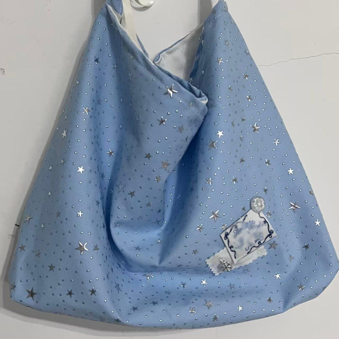 高颜值蓝色星星烫钻百搭帆布包2025新款韩系甜美通勤单肩斜挎包女,箱包皮具/热销女包/男包,时尚帆布包,淘宝优惠券,粉丝福利购,淘宝优惠卷