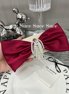 韩国东大门新娘超正红色珍珠流苏新娘复古气质高级缎面蝴蝶结弹夹