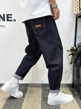 经典蓝色牛仔裤男秋冬阔腿宽松哈伦裤2024简约风挽边九分小直脚裤