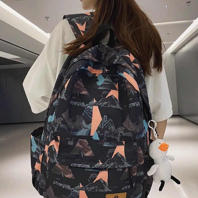 韩版双肩包女百搭休闲大容量学生书包初高中校园涂鸦旅行背包男