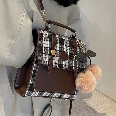 高级感搭扣女士双肩背包女2025时尚斜挎包ins小众学生单肩手提包