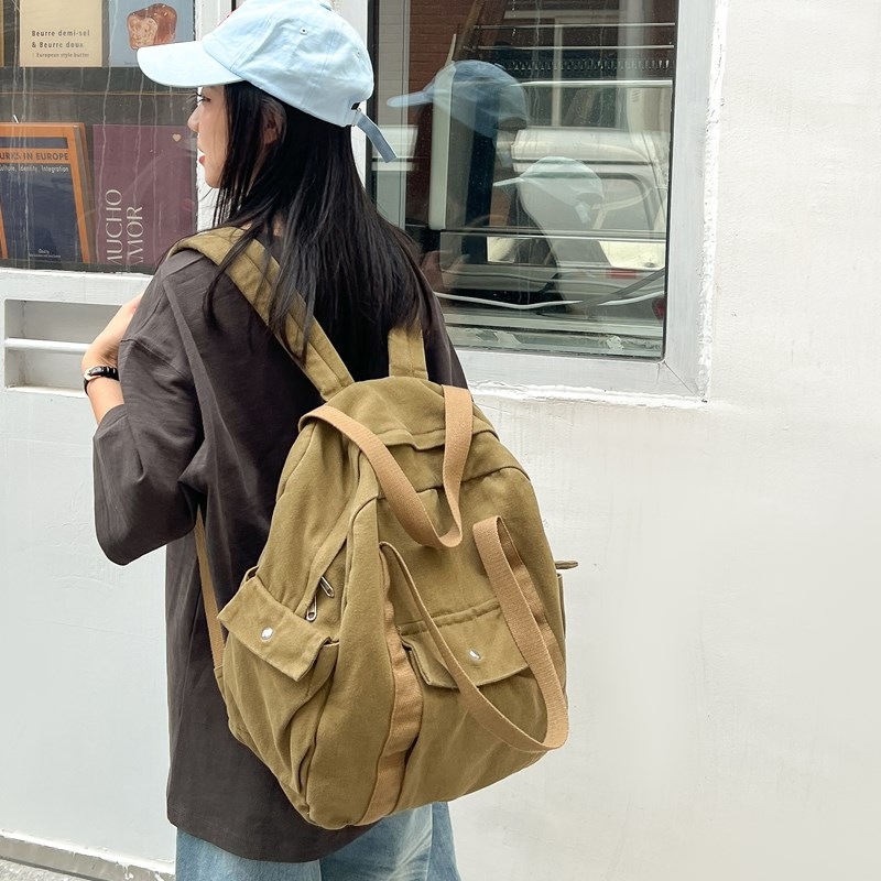 新款帆布书包男女大学生初高中双肩背包手提水洗休闲出游背包