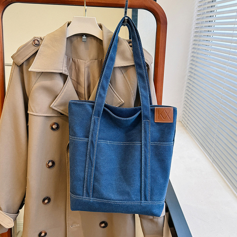 牛仔布通勤包包女2024新款大容量学生手提布袋休闲慵懒风单肩包