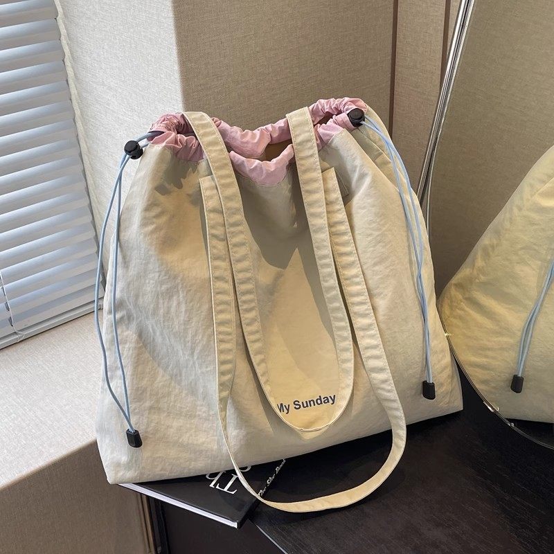 休闲学生上课帆布包包女2025新款夏天大容量百搭单肩包通勤托特包,箱包皮具/热销女包/男包,托特包,淘宝优惠券,粉丝福利购,淘宝优惠卷