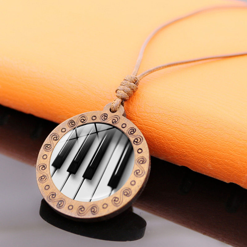 钢琴建音乐符号时光宝石木头吊坠项链女欧美复古棕蜡绳毛衣链