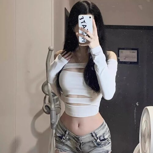 辣妹显胸大镂空一字领露肩上衣女