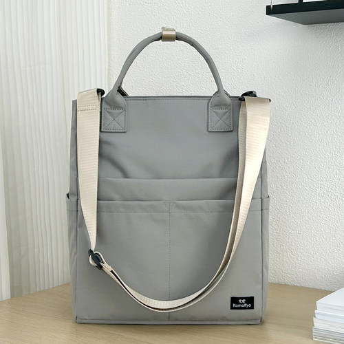 日系女通勤大容量多口袋斜挎包