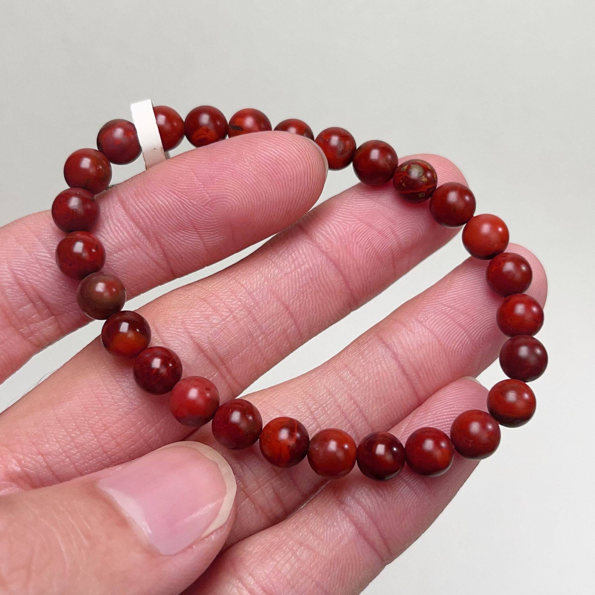 407C46凉山九口料南红鸡血包浆单圈手串