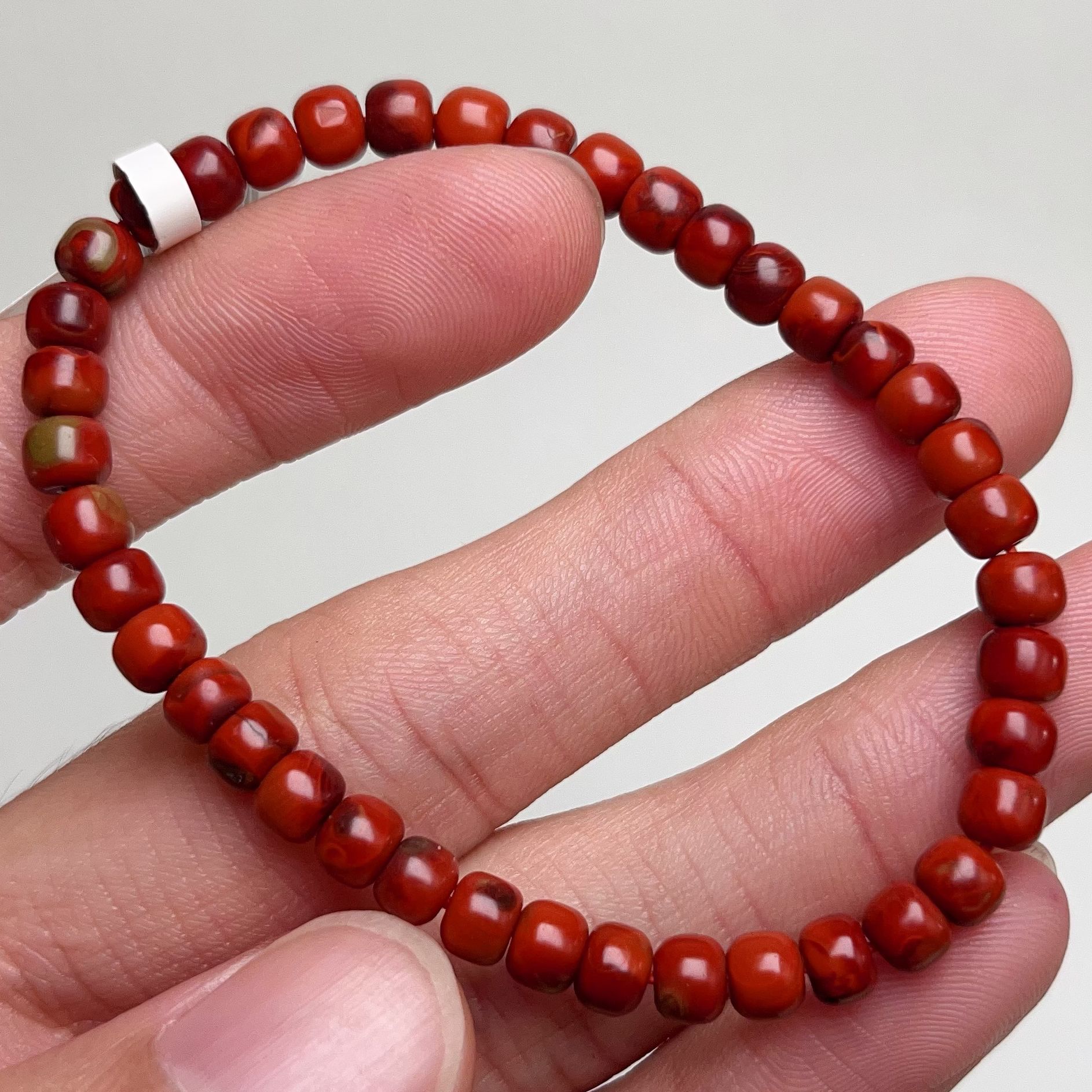 605A01凉山九口料南红鸡血包浆单圈手串